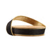 A spool of 1" Black and Gold Reversible Classic Velvet Ribbon (7115W-030-25E), featuring black velvet with shiny gold edges, partially unspooled and coiled around a circular cardboard reel.