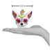 A hand holds the Dia De Los Muertos Dog Ornament Old World Christmas 26097, a 3.25-inch decorative piece shaped like a Chihuahua head and adorned with vibrant Day of the Dead designs in pink, blue, green, purple, and gold—an eye-catching ornament perfect for celebrating the Mexican holiday.