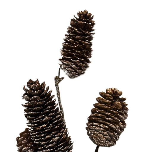 Close-up of brown pinecones with layered scales and a subtle frosted finish on the 28-inch pinecone spray, XS47124-083.