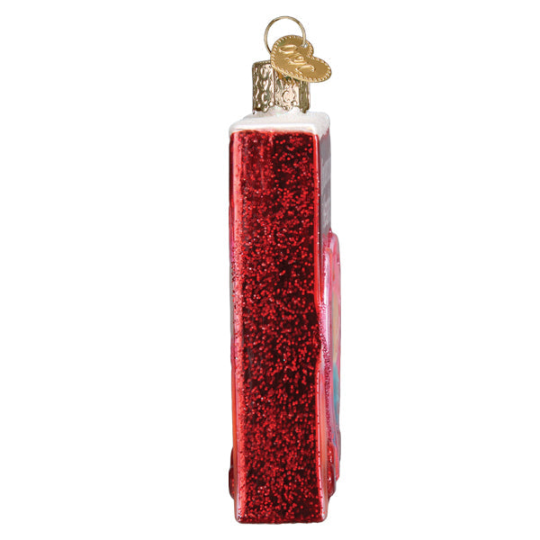Conversation Hearts Candy Old World Christmas Ornament 32623, a glittery red heart-shaped ornament with white trim and a gold heart-shaped charm at the top.