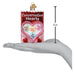 A hand holds a Conversation Hearts Candy Old World Christmas Ornament 32623, a rectangular glass ornament decorated with candy conversation hearts, shown next to a 4-inch scale line.