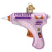 Hot Glue Gun Old World Christmas Ornament 32629, a light purple glass ornament shaped like a glue gun with glitter accents, perfect for crafters.