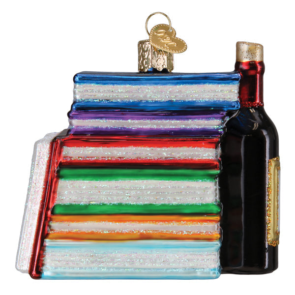 Book Club Old World Christmas Ornament 32653, a glass ornament shaped like a stack of colorful books next to a wine bottle.