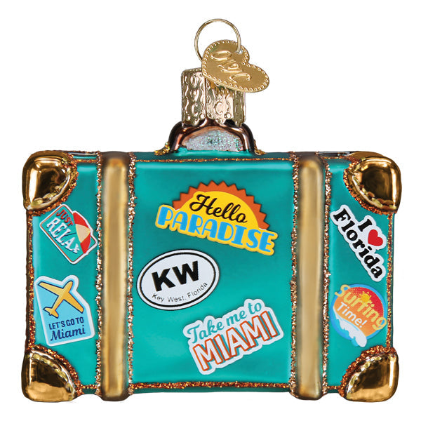 Miami Suitcase Old World Christmas Ornament 32659 is a teal suitcase ornament decorated with travel-themed stickers, including Hello Paradise, I heart Florida, and Take me to Miami.