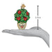 A hand holds a 3.75-inch tall Plant Mom Old World Christmas Ornament 36341, a glass ornament shaped like a potted hibiscus plant with the label PLANT MOM.