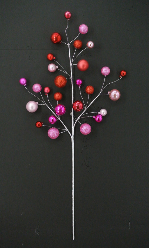 The 30 Pink, Hot Pink and Red Glitter Mixed Ball Spray 40339-PKBTYRD showcases silver stems with pink, hot pink, and red glittery balls, arranged elegantly against a plain black background.