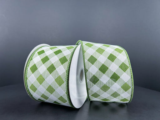 Two spools of White Linen/Sage-Moss Diamond Ombre ribbon, with a classic gingham pattern, are set against a dark gray background.
