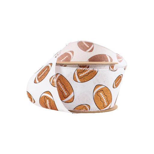 White fabric hat with a wide brim featuring brown football designs resembles the 2.5 Glitter Footballs on White Ribbon 4418W-029-63E, showcasing sporty elegance with its folded look and wired ribbon detailing.