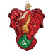 A Dungeons and Dragons Red Dragon Old World Christmas Ornament 44231 featuring a red dragon holding a green twenty-sided die.