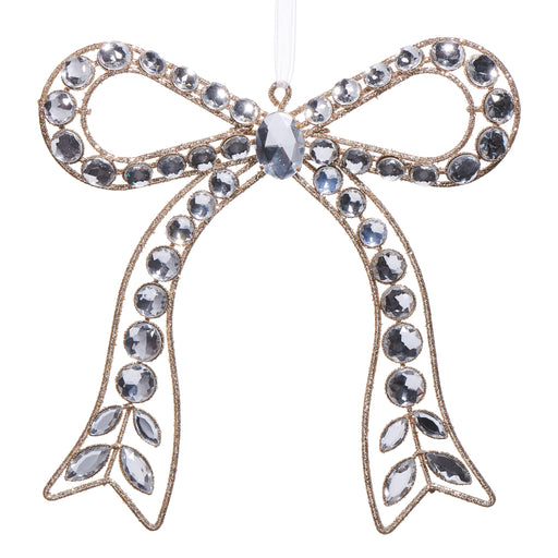 The 7.25" Clear Jeweled Bow Ornament 4513577 from the Holiday Rendezvous Collection features looped ends, hanging tails, sparkling clear gemstones, gold accents, and hangs by a white ribbon.