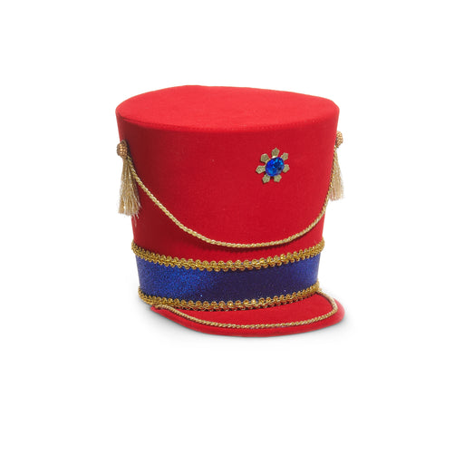 The 8.25" Nutcracker Hat Tree Topper (4516703) features a bold red design with gold trim, side tassels, a blue and gold band, and a blue gem flower—ideal for your Christmas Shoppe or as a festive tree topper.