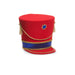 The 8.25" Nutcracker Hat Tree Topper (4516703) features a bold red design with gold trim, side tassels, a blue and gold band, and a blue gem flower—ideal for your Christmas Shoppe or as a festive tree topper.