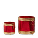 The 8" Red and Gold Containers 4525965 by Raz are metal sheet cylinders of different sizes with gold rims, bases, and decorative rings, creating festive Christmas decor against a white background.