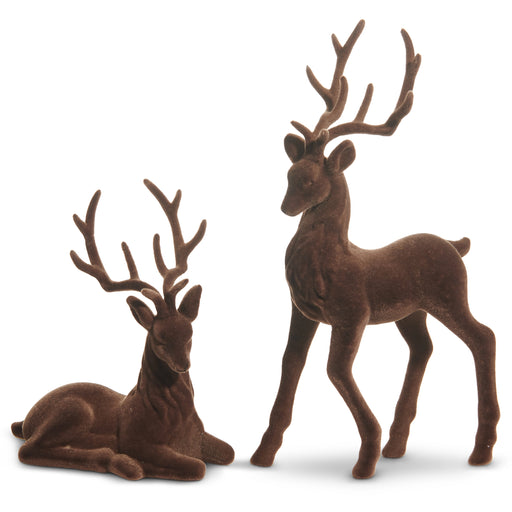 The 15" Brown Flocked Deer 4540866 features two brown, velvety deer figurines—one standing and one lying down—with detailed antlers and a soft, textured finish for a lifelike decorative display.
