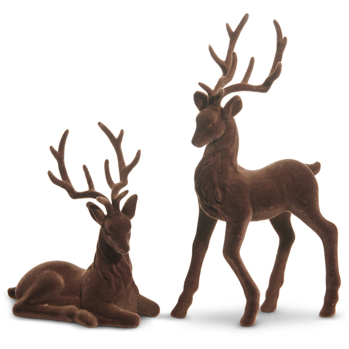 The 15" Brown Flocked Deer 4540866 features two brown, velvety deer figurines—one standing and one lying down—with detailed antlers and a soft, textured finish for a lifelike decorative display.