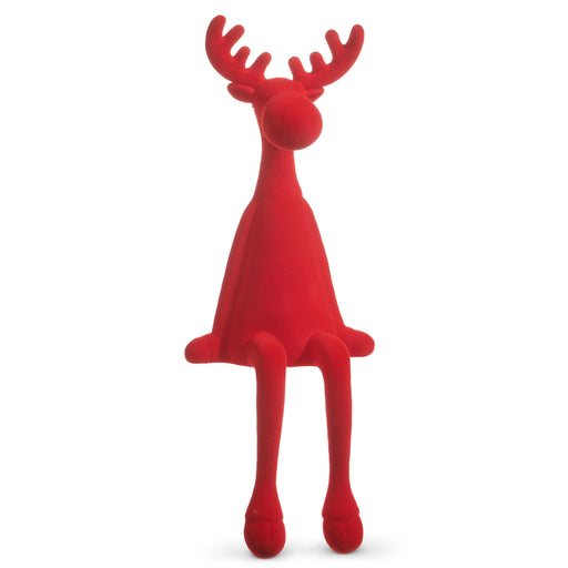 The 19" Red Flocked Sitting Moose (4540875) features a smooth, stylized surface, long dangling legs, and raised antlers—a charming addition to the Claus Collection.
