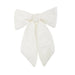 An 11" Red Velvet Bow Clip-on Ornament, featuring wide loops and long, pointed tails, perfect as a Christmas decoration and shown against a plain white background.