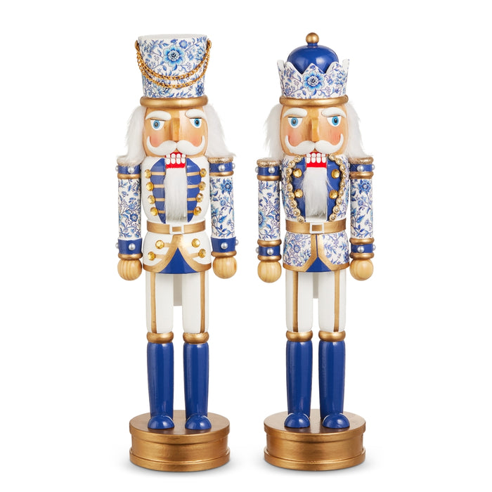 Elevate your blue and white Christmas decor with the 14.75″ Chinoiserie Nutcracker Christmas Figure (RAZ 4623009), featuring intricate blue, white, and gold chinoiserie patterns, gold details, a blue hat, and a classic white beard—all set atop a gleaming gold base for the perfect festive accent.