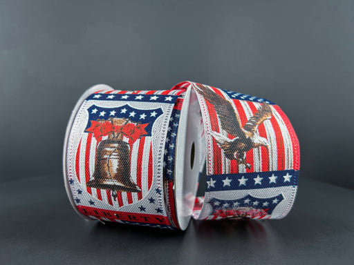 Two spools of 2.5X10Y White Linen/Liberty Bell Ribbon showcase American patriotic designs: one wired with the Liberty Bell on red and white stripes, and the other featuring an eagle with wings outstretched, both adorned with stars and a blue border.