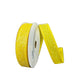 A roll of 7/8X10Y Yellow Candy Glittered Satin Ribbon 46420-05-22 is upright against a dark gray background. One end is unrolled, standing vertically to highlight the sparkly texture.