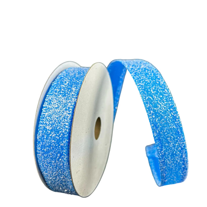 Two spools of 7/8X10Y Turquoise Candy Glittered Satin Ribbon 46420-05-39 are shown on a dark background. One stands upright, the other is unraveled, revealing the glittery texture of the wired satin ribbon.