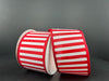 The Red Satin-White Stripes/Lm Edge (2.5X10Y, 46425-40-12) ribbon features eye-catching red and white horizontal stripes on a dark background, with a solid red edge visible as it unrolls.
