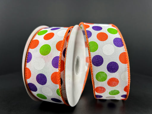 Two rolls of 1.5X10Y White Linen/Purple-Lime-Orange Dots Ribbon feature vibrant polka dots on white backgrounds with orange edges. The wired ribbons stand upright and gently curve against a dark, gradient background.