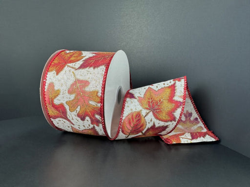 A roll of 2.5X10Y Ivory Linen/Big Plum-Pink-Yellow Falling Leaves Ribbon features pink and yellow autumn leaves on ivory linen, adding a vibrant seasonal touch to your crafts.