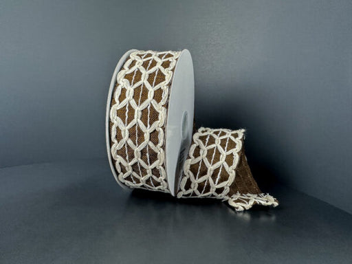 A spool of 1.5X10Y Ivory Rust Scallop Burlap/Brown Linen Ribbon (61520-09-38) is displayed against a dark gray background, with one end of the ribbon unrolled and draped to the side.