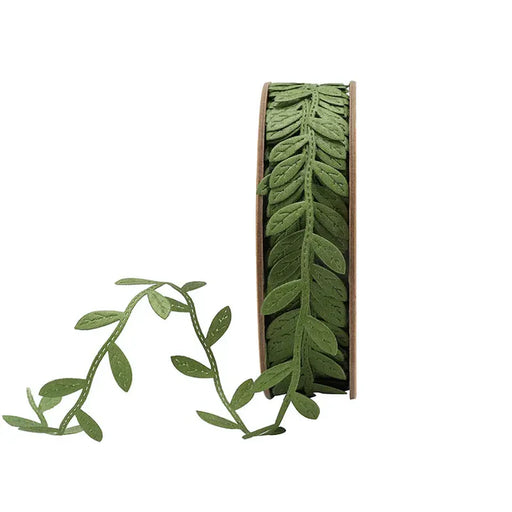 A spool of 1 Inch Green Ultra Sonic Trim Vine with Leaves Ribbon 6203-552-25E, featuring leafy cutout details, perfect for wreaths or gift wrapping, displayed against a white background.