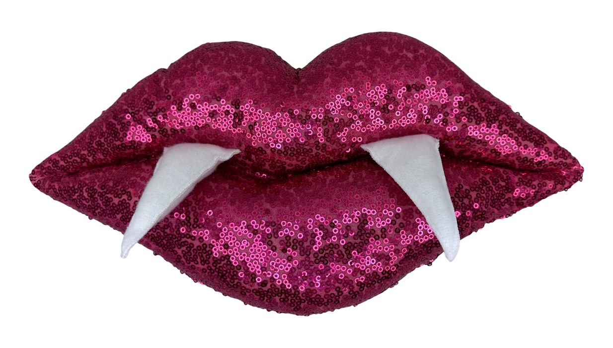 The 7 x 13 x 2 Hot Pink Plush Vampire Lip (63825BT) features sparkling sequin lips with two large white fangs.