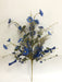 The 24 Long Blue Mixed Fall Filler Spray 65271-BL features artificial blue flowers and green leaves on slender stems, ideal as a fall filler spray against a simple white backdrop.