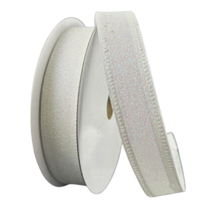 A roll of 7/8" white ribbon with flat iridescent glitter and wired edges, partially unspooled for display.