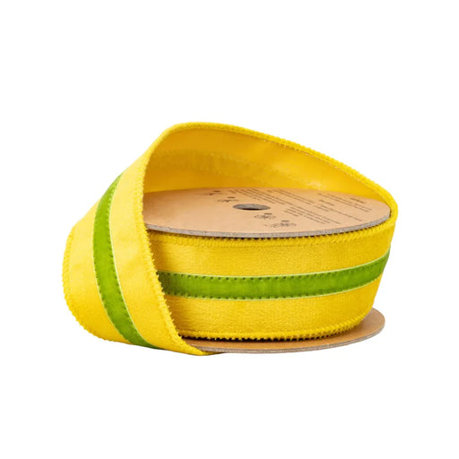 A spool of 1.5 Inch Yellow Velvet Ribbon with Green Center Stripe (7021W-662-38E), partially unrolled on a white background—ideal for gift wrapping or enhancing wreath ribbon designs.