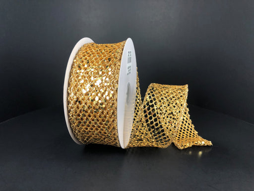 A partially unrolled spool of 1.5X10Y Gold Mega Glitter Net Ribbon (71123-09-15) with a honeycomb pattern is displayed against a plain black background.