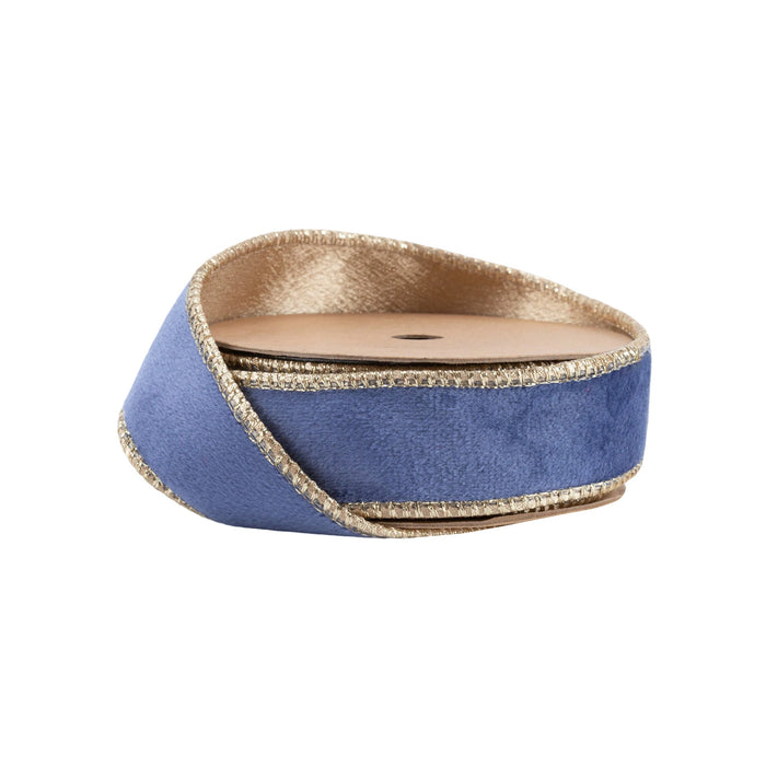 A partially unspooled and coiled 1" French Blue and Gold Reversible Classic Velvet Ribbon (7115W-338-25E) is displayed against a white background.
