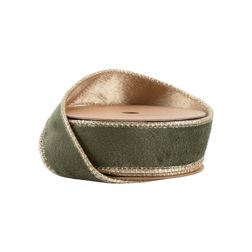 The 1" Moss and Gold Reversible Classic Velvet Ribbon 7115W-570-25E features gold metallic edges, a cardboard center, and wired construction for perfect bows and elegant designs. Partially unrolled, it displays rich moss green velvet with stylish structure.
