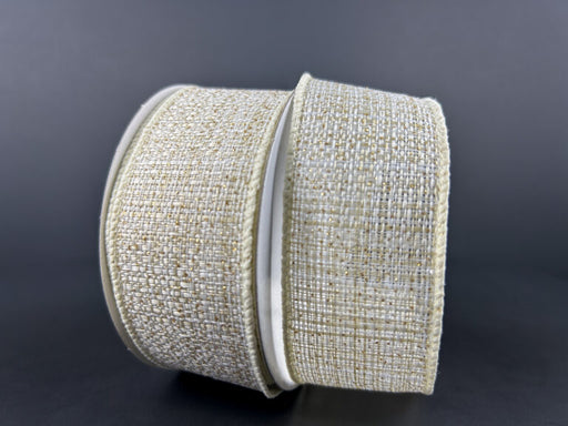 Two rolls of 1.5X10Y Ivory-Gold-Gold Metallic Tweed Ribbon 72414-09-18, featuring a woven ivory gold look and shimmery finish, rest slightly overlapping against a dark background.
