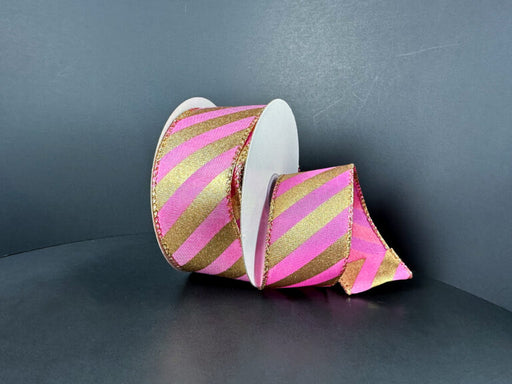 A spool of 1.5X10Y Dk Pink Satin/Gold Metallic Diagonal Stripes Ribbon (72507-09-15) is partially unrolled against a plain dark background.