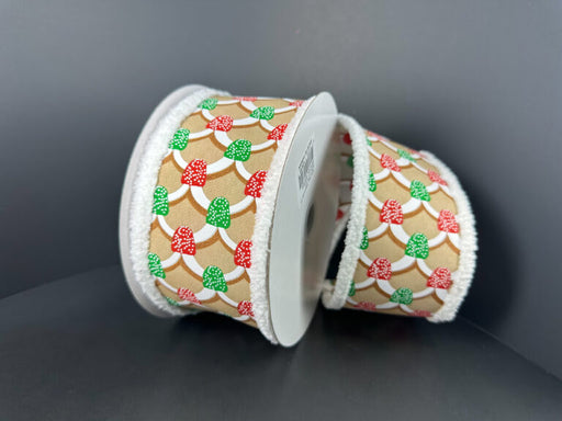 Two rolls of 2.5X10Y Gingerbread Roof/Pink-Mint Gumdrops/White Fuzz Edge Ribbon (72513-40-17) feature a gingerbread house roof pattern with pink-mint gumdrops and fuzzy white edges, shown on a plain dark background.