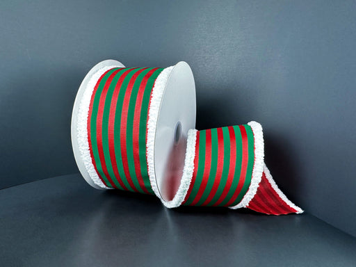 A partially unrolled spool of 2.5x10Y green and pink ribbed satin ribbon with red vertical stripes and white fuzzy edges (72520-40-17) is displayed against a dark background.