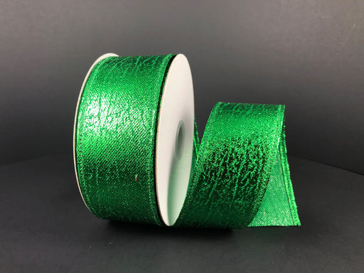 A spool of 1.5X10Y Emerald Crackle Lame Ribbon (75206-09-17) with a textured, shiny finish is partly unrolled and displayed against a plain black background.