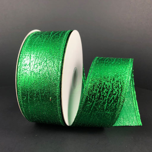A spool of 1.5X10Y Emerald Crackle Lame Ribbon (75206-09-17) with a textured, shiny finish is partly unrolled and displayed against a plain black background.