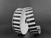 A spool of 7/8" Black & White Striped Satin Ribbon (76466-05-21) is partially unwound and stands upright on a dark surface against a plain, dark background.