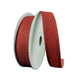 The 7/8"X10Y Red All Flat Glitter Wired Ribbon (76467-05-12) stands upright against a gray background, with some of the red glitter ribbon unrolled and curving gracefully toward the front.