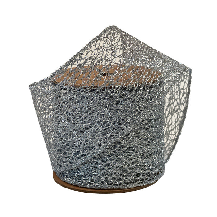 A roll of 3" Silver Mesh Ribbon (WR-10253-075-10) with a glittery open-weave pattern is partially unrolled and displayed on a cardboard spool against a white background.