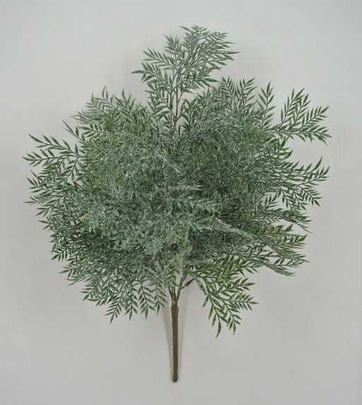 The 21" Plastic Leaf with Iced Bush Spray 85257 features artificial green fern-like leaves with a snowy white dusting, displayed against a plain white background.