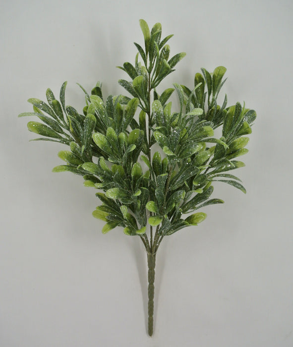 The 17" Iced Mistletoe Bush with 7 Stems (85273) features frosted green leaves in a fan shape, perfect for festive decor. Shown against a plain light gray background.