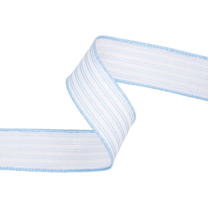 The 1.5 Inch Light Blue Ticking Stripe Ribbon 9313W-311-38E features blue stitched edges and a white background, arranged in a zigzag pattern—ideal for farmhouse decor or wreath making.