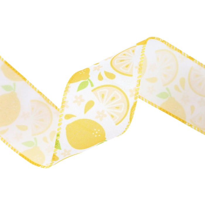 The 2.5 Inch Lemon Slice on White Ribbon 9318W-640-63E features whole lemons, slices, and flowers with a yellow stitched edge—perfect for wreaths or pairing with blue bows for a fresh, cheerful look.